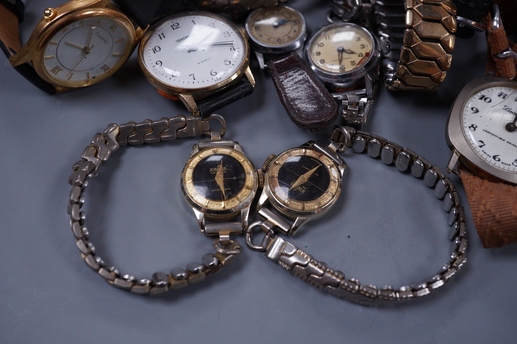 Seven assorted gentleman's wrist watches including steel Ingersoll and steel Technics, Adano and Sekonda and twelve assorted lady's wrist watches including Timex, Editia and a yellow metal Winegartens.